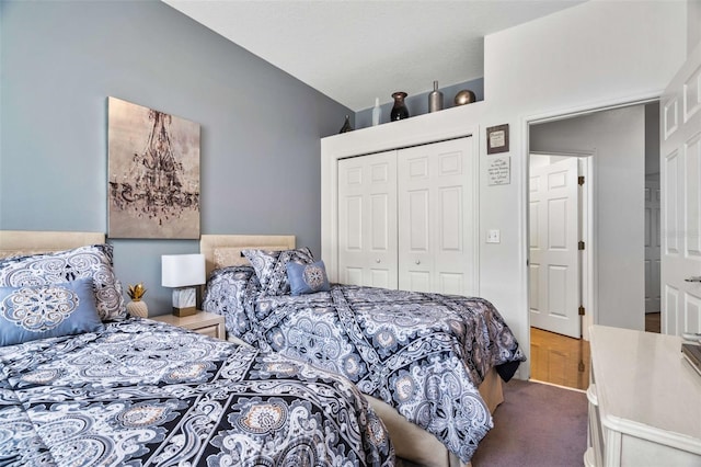 bedroom with a closet and carpet flooring