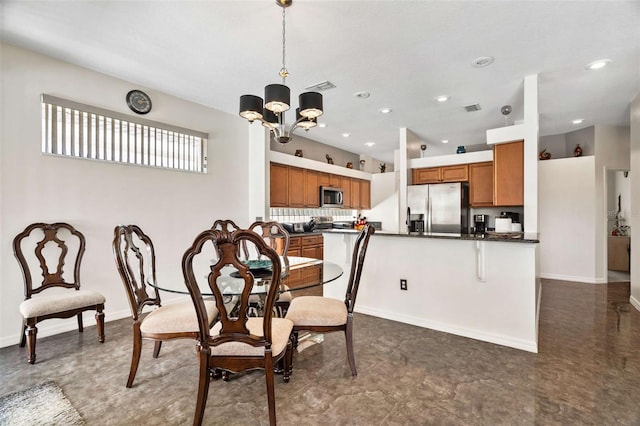 dining space with a notable chandelier