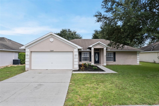 single story home featuring a front yard and a garage