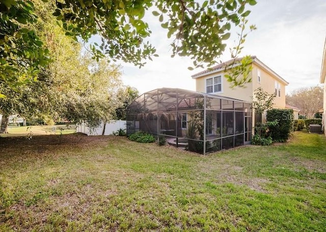 view of yard featuring a lanai