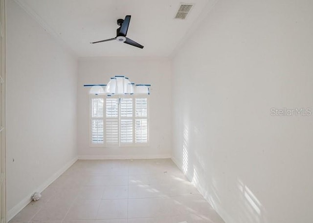 unfurnished room featuring light tile patterned flooring and ceiling fan