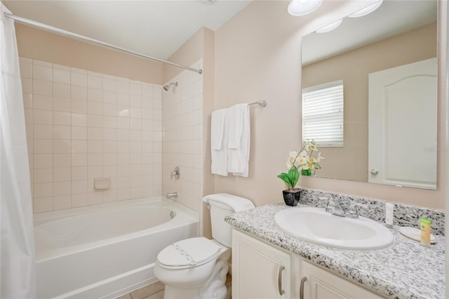 full bathroom featuring tile patterned flooring, vanity, toilet, and shower / tub combo with curtain