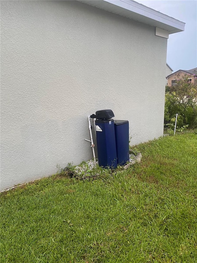 view of home's exterior featuring a yard