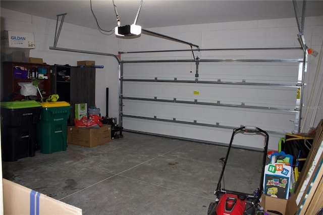 garage featuring a garage door opener