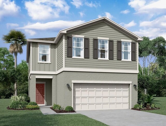 view of front of home with a garage and a front lawn