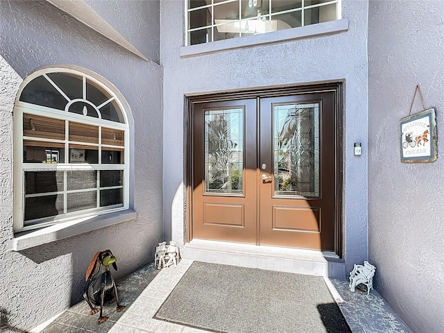 doorway to property with french doors