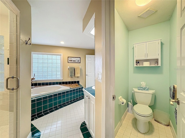 full bathroom featuring tile patterned flooring, independent shower and bath, vanity, and toilet