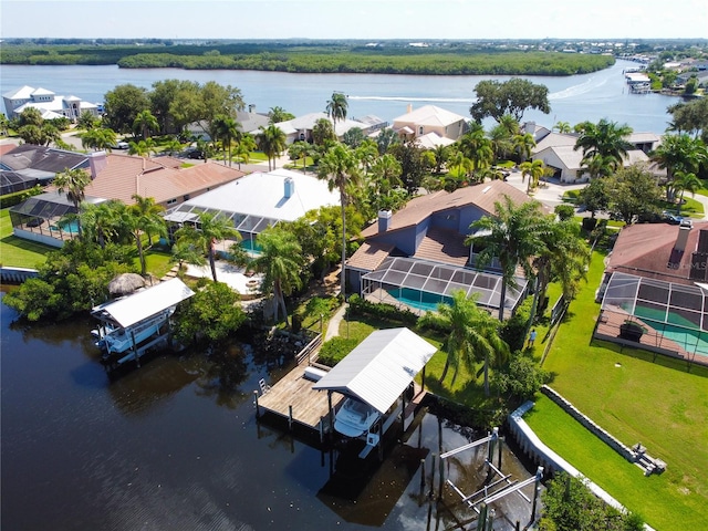 drone / aerial view with a water view