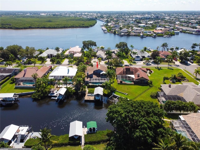 drone / aerial view with a water view