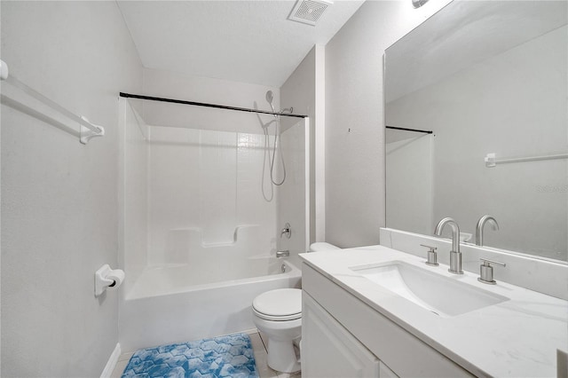 full bathroom featuring shower / tub combination, tile patterned floors, toilet, vanity, and a textured ceiling