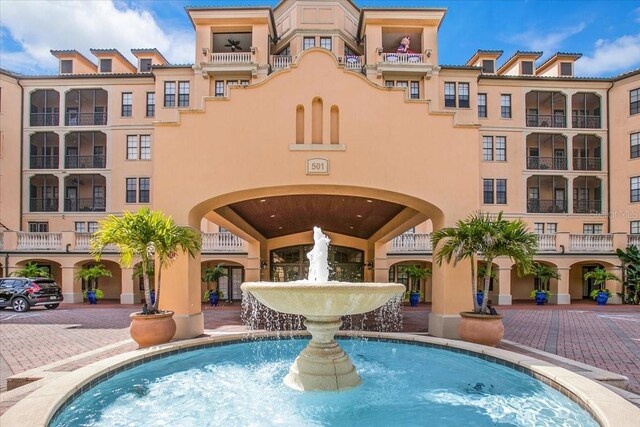 view of pool with pool water feature