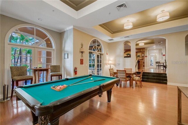 recreation room with french doors, hardwood / wood-style floors, billiards, and ornamental molding