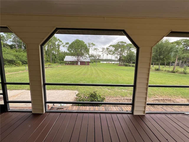 unfurnished sunroom featuring plenty of natural light