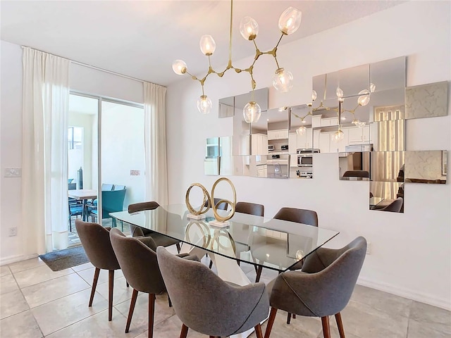 tiled dining room featuring a notable chandelier