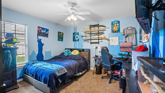 bedroom with wood-type flooring and ceiling fan