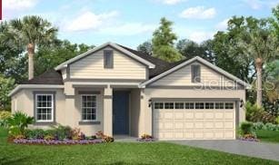 view of front of home with a front yard and a garage