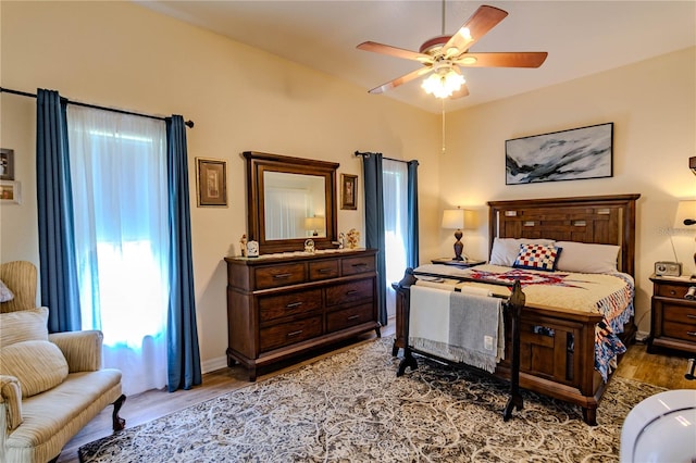 bedroom featuring ceiling fan and wood-type flooring