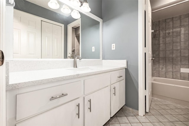 bathroom with tile patterned floors, vanity, and shower / bathing tub combination