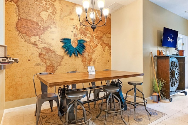 tiled dining room featuring a notable chandelier