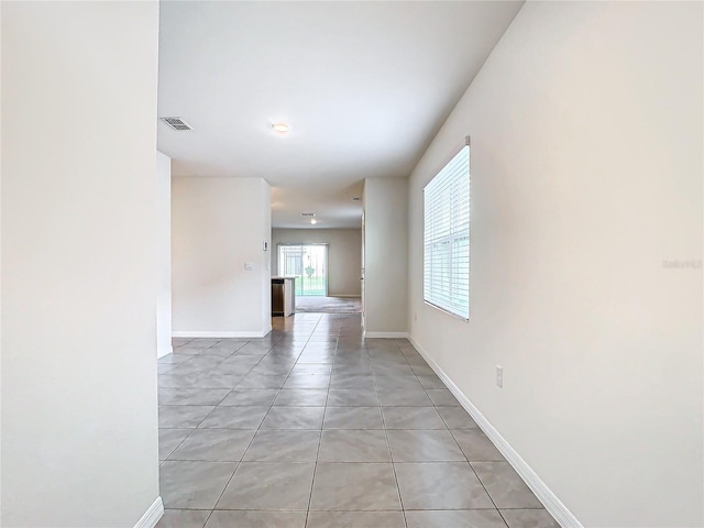 empty room featuring light tile patterned flooring