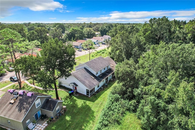 bird's eye view featuring a view of trees