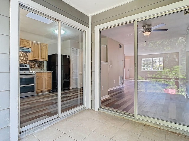 interior space with a ceiling fan