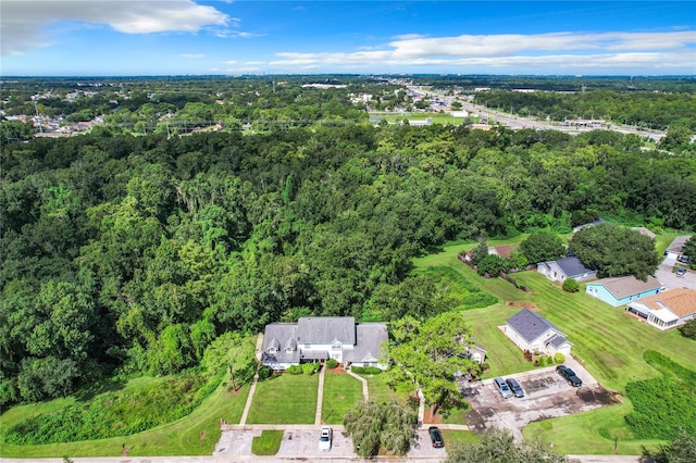 bird's eye view featuring a forest view