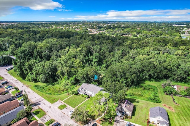 aerial view featuring a forest view