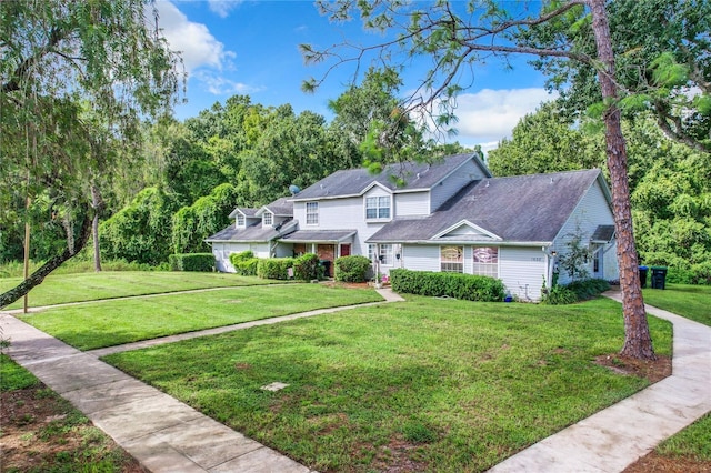 traditional-style home with a front yard