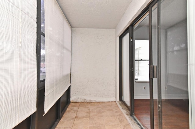 954 Courtyard Ln Unit 11, Orlando, FL 32825 - corridor with a textured ceiling