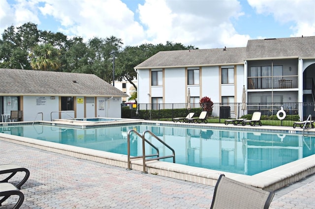 954 Courtyard Ln Unit 11, Orlando, FL 32825 - community pool featuring fence