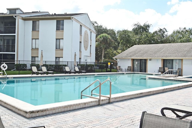 view of swimming pool featuring a patio