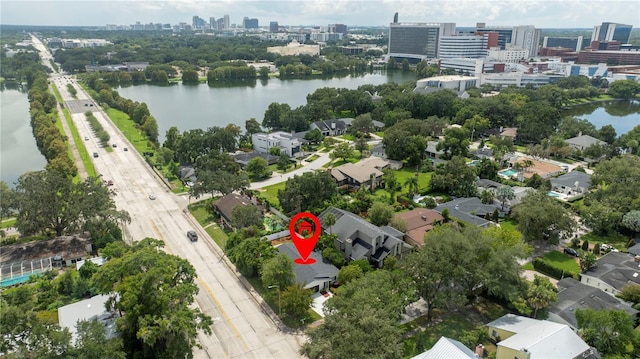 drone / aerial view with a water view and a view of city