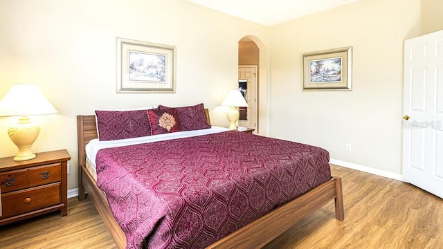 bedroom with light hardwood / wood-style flooring