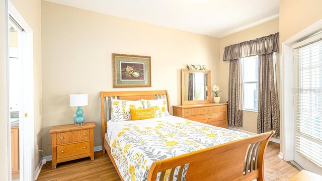 bedroom featuring light wood-type flooring