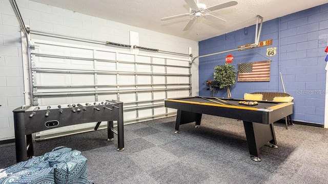 rec room with a textured ceiling, billiards, and ceiling fan