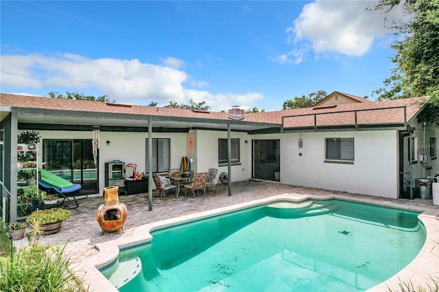 back of property with a patio area