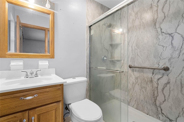 1005 Crescent Pkwy, Deland, FL 32724 - bathroom featuring toilet, a marble finish shower, and vanity