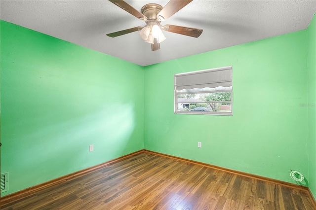 1005 Crescent Pkwy, Deland, FL 32724 - empty room featuring baseboards, ceiling fan, wood finished floors, and visible vents