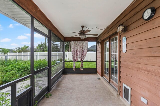 1005 Crescent Pkwy, Deland, FL 32724 - unfurnished sunroom featuring ceiling fan