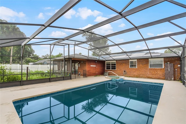 1005 Crescent Pkwy, Deland, FL 32724 - view of pool with glass enclosure, a patio area, and a pool with connected hot tub