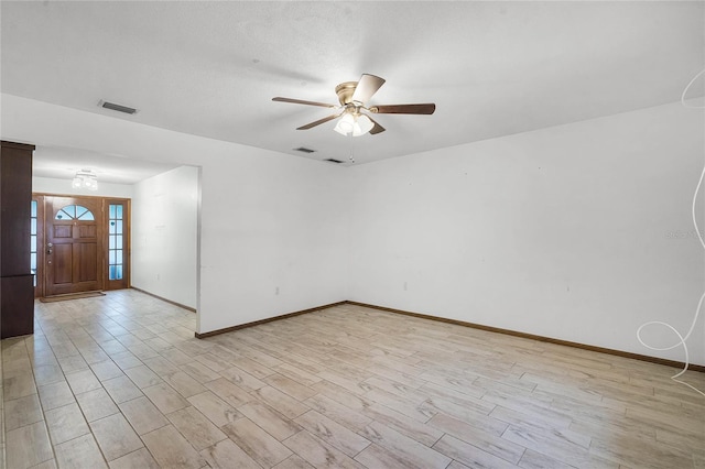 1005 Crescent Pkwy, Deland, FL 32724 - empty room featuring baseboards, ceiling fan, light wood-type flooring, and visible vents