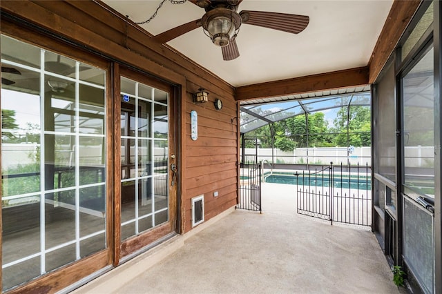 1005 Crescent Pkwy, Deland, FL 32724 - unfurnished sunroom featuring ceiling fan