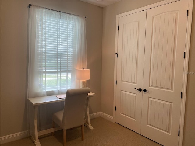 office area with baseboards and carpet flooring