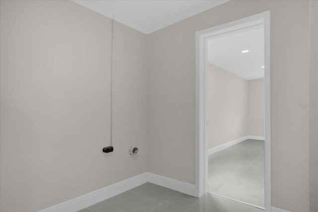 laundry room with light tile patterned flooring