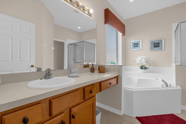 bathroom with vanity, plus walk in shower, and tile patterned flooring