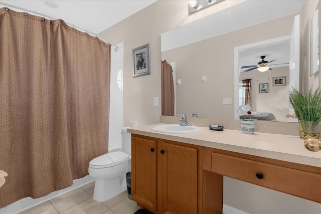 full bathroom featuring vanity, shower / tub combo, toilet, tile patterned floors, and ceiling fan