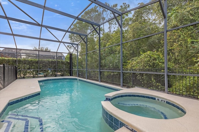 view of pool with glass enclosure