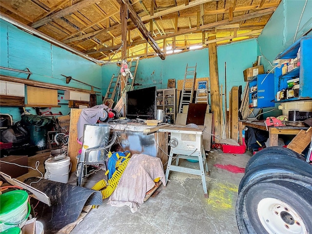 misc room with concrete flooring