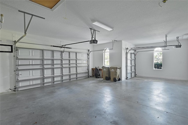 garage featuring a garage door opener